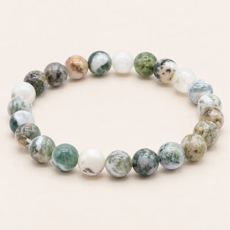 Bracelet en agate arbre – Perles de 8 mm, aux nuances blanches et aux motifs verts ramifiés.