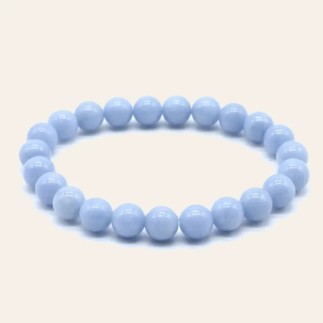 Bracelet en angélite à perles rondes de 8 mm, aux nuances bleu doux à bleu grisé.