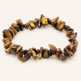 Bracelet baroque en œil de tigre aux pierres polies brunes et dorées, présenté sur fond beige clair.